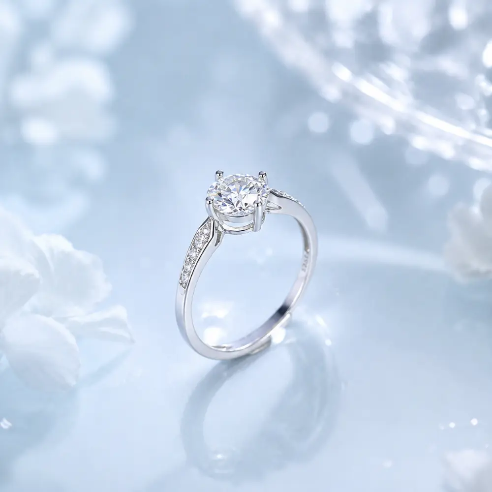 Simple Sterling Silver Four-Prong Moissanite Ring detail 1