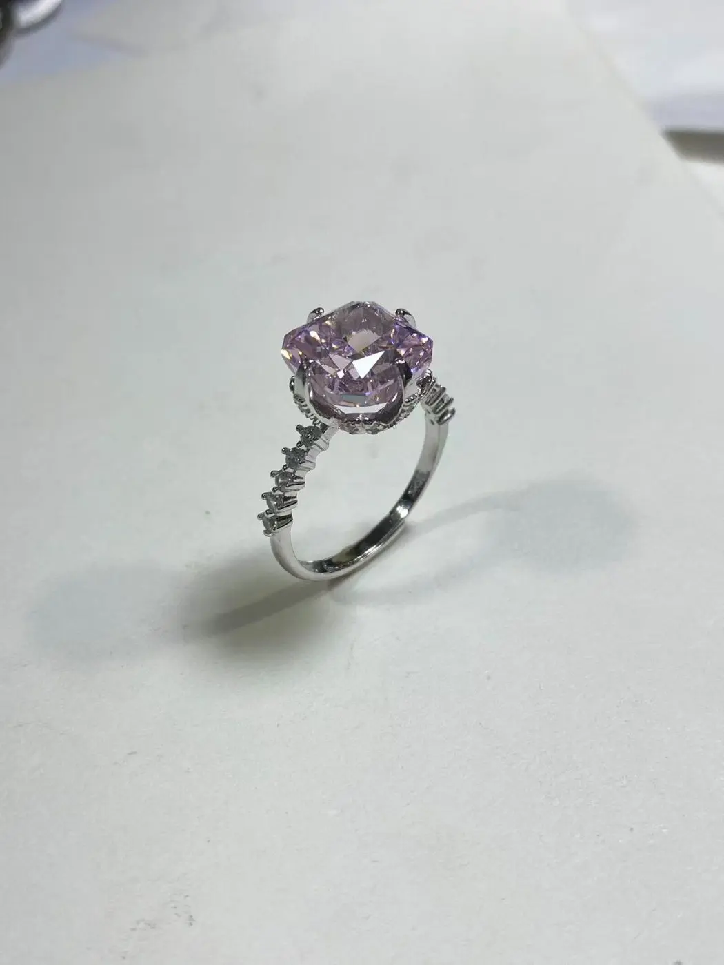 Pure silver ring with a purple square main stone detail 1